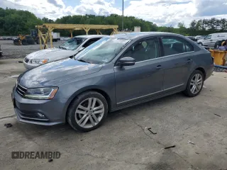 2017 Volkswagen Jetta SEL z VIN 3VWL17AJ6HM392174, wystawiony jako Copart lot #57771225 z przebiegiem 31 148 mil mil oraz Szkoda całkowita • Salvage title. Historia ofert i sprzedaży dostępna na DreamBid. Obrazek 1.
