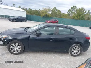 2015 Mazda 3 i Sport with VIN 3MZBM1U77FM229529, listed as a IAAI auction lot 41340737 with 150,587 mi miles and . Bid and sale history available at carsss.com. Image 14.