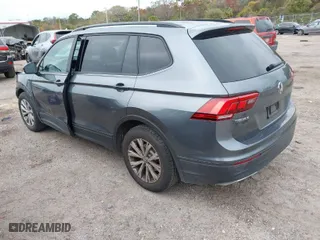 2019 Volkswagen Tiguan S with VIN 3VV1B7AX3KM047494, listed as a IAAI auction lot 41355084 with 90,612 mi miles. Bid and sale history available at carsss.com. Image 3.