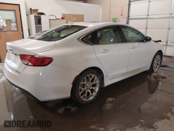 2015 Chrysler 200 C with VIN 1C3CCCEG3FN543757, listed as a IAAI auction lot 41468410 with 145,041 mi miles. Bid and sale history available at carsss.com. Image 4.