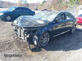 2014 Kia Cadenza Premium with VIN KNALN4D77E5163619, listed as a IAAI auction lot 40759426 with 154,368 mi miles. Bid and sale history available at carsss.com. Image 2.
