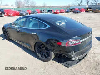 2020 Tesla Model S Long Range with VIN 5YJSA1E23LF381872, listed as a IAAI auction lot 41763046 with 96,720 mi miles and . Bid and sale history available at DreamBid. Image 3.
