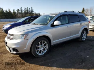 2013 Dodge Journey Crew with VIN 3C4PDCCG3DT642654, listed as a Copart auction lot 48866915 with 207,362 mi miles and Salvage title. Bid and sale history available at DreamBid. Image 1.