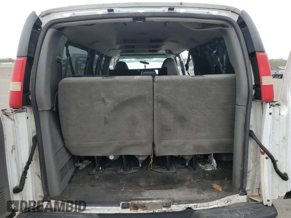 2012 Chevrolet Express Passenger 1LT z VIN 1GAZG1FA6C1175370, wystawiony jako Copart lot #48130955 z przebiegiem 268 170 mil mil oraz Szkoda całkowita • Salvage title. Historia ofert i sprzedaży dostępna na DreamBid. Obrazek 10.