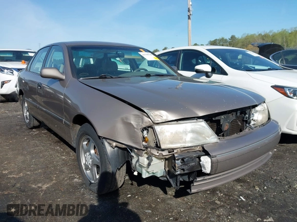 1998 Toyota Avalon XL with VIN 4T1BF18B0WU218570, listed as a IAAI auction lot 41790708 with 103,906 mi miles and . Bid and sale history available at DreamBid. Image 6.