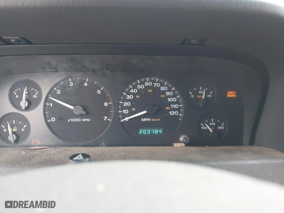 1999 Jeep Grand Cherokee Laredo with VIN 1J4GW58N4XC676836, listed as a IAAI auction lot 41799381 with 203,784 mi miles. Bid and sale history available at carsss.com. Image 7.