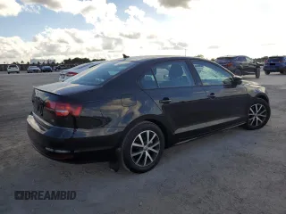 2016 Volkswagen Jetta Sedan 1.4T SE with VIN 3VWD67AJ0GM390490, listed as a Copart auction lot 44711055 with 185,046 mi miles and Salvage Title. Bid and sale history available at carsss.com. Image 3.