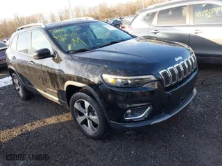 2021 Jeep Cherokee Limited with VIN 1C4PJMDX8MD108052, listed as a IAAI auction lot 41248255 with 131,929 mi miles. Bid and sale history available at carsss.com. Image 1.