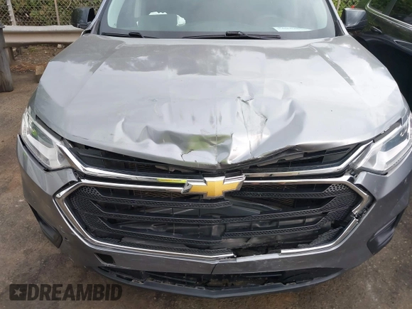2020 Chevrolet Traverse LS with VIN 1GNERFKW5LJ245009, listed as a IAAI auction lot 42029854 with 77,771 mi miles and . Bid and sale history available at DreamBid. Image 6.