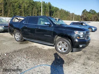 2018 Chevrolet Suburban Premier with VIN 1GNSCJKCXJR235829, listed as a Copart auction lot 74817724 with 90,067 mi miles and Non Repairable. Bid and sale history available at carsss.com. Image 4.