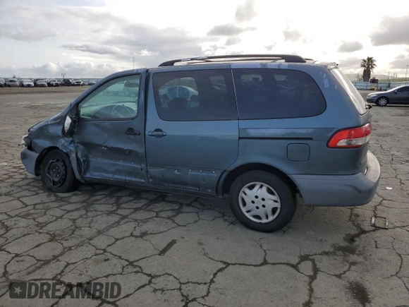 2002 Toyota Sienna CE with VIN 4T3ZF19C22U477486, listed as a Copart auction lot 51169555 with 187,964 mi miles and Salvage Title. Bid and sale history available at carsss.com. Image 2.