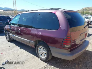 2000 Plymouth Voyager Grand SE z VIN 1P4GP44G8YB513887, wystawiony jako IAAI lot #41515488 z przebiegiem 330 867 mil mil oraz . Historia ofert i sprzedaży dostępna na DreamBid. Obrazek 3.