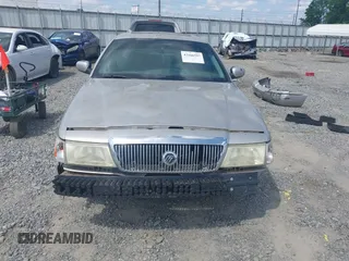 2004 Mercury Grand Marquis LS Premium z VIN 2MHFM75W84X658355, wystawiony jako IAAI lot #42166597 z przebiegiem 214 858 mil mil oraz . Historia ofert i sprzedaży dostępna na DreamBid. Obrazek 13.