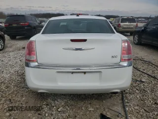 2014 Chrysler 300 z VIN 2C3CCAAG6EH160123, wystawiony jako Copart lot #51525765 z przebiegiem 145 338 mil mil oraz Czysty tytuł • Clean title. Historia ofert i sprzedaży dostępna na DreamBid. Obrazek 6.
