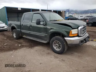 2000 Ford F-250 XL with VIN 1FTNW21F5YEB21513, listed as a Copart auction lot 82013464 with 383,819 mi miles and Salvage title. Bid and sale history available at DreamBid. Image 4.