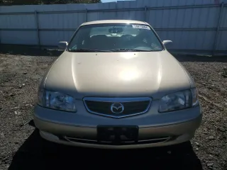 2001 Mazda 626 LX with VIN 1YVGF22C815231985, listed as a Copart auction lot 74913884 with 52,699 mi miles and Clean Title. Bid and sale history available at carsss.com. Image 5.