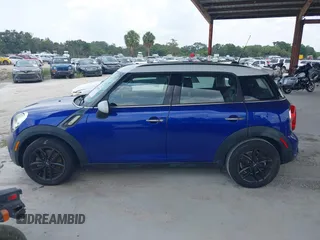 2016 MINI Countryman S with VIN WMWZC3C50GWT08698, listed as a IAAI auction lot 42493302 with 61,306 mi miles and . Bid and sale history available at DreamBid. Image 14.