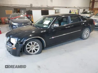 2006 Chrysler 300 C with VIN 2C3KA63H06H421414, listed as a IAAI auction lot 42144274 with 118,692 mi miles. Bid and sale history available at carsss.com. Image 2.