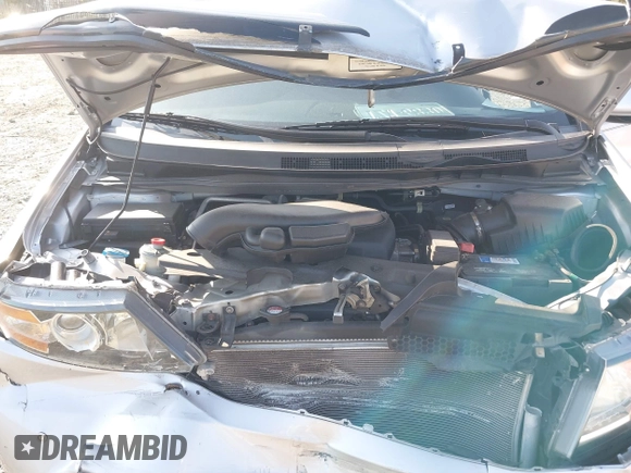 2014 Honda Odyssey Touring with VIN 5FNRL5H95EB108427, listed as a IAAI auction lot 39992643 with 100,658 mi miles and . Bid and sale history available at DreamBid. Image 10.