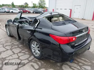 2015 Infiniti Q50 Premium with VIN JN1BV7AR8FM396828, listed as a IAAI auction lot 42313019 with 130,707 mi miles and . Bid and sale history available at DreamBid. Image 3.