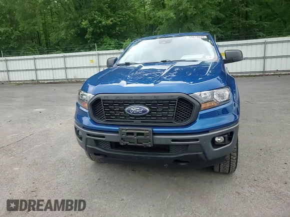 2020 Ford Ranger XL with VIN 1FTER4FHXLLA86940, listed as a Copart auction lot 58614045 with 77,249 mi miles and Salvage title. Bid and sale history available at DreamBid. Image 13.