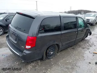 2017 Dodge Grand Caravan SE with VIN 2C4RDGBG9HR595737, listed as a IAAI auction lot 41914992 with 104,096 mi miles. Bid and sale history available at carsss.com. Image 4.
