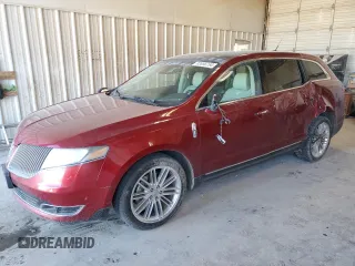 2013 Lincoln MKT EcoBoost with VIN 2LMHJ5AT4DBL51634, listed as a Copart auction lot 83596754 with 132,719 mi miles and Salvage Title. Bid and sale history available at carsss.com. Image 1.