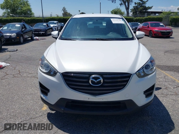 2016 Mazda CX-5 Sport с VIN JM3KE2BY5G0793032, выставлен на аукционе IAAI как лот 42128706 с пробегом 52 010 миль миль и . История ставок и продаж доступна на DreamBid. Изображение 12.