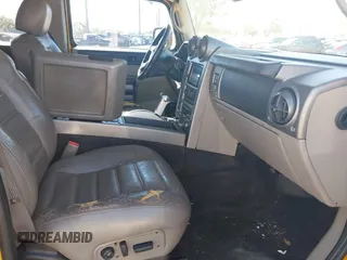 2003 Hummer H2 with VIN 5GRGN23U93H108017, listed as a IAAI auction lot 41793034 with 203,739 mi miles. Bid and sale history available at carsss.com. Image 5.