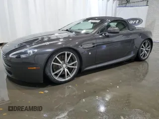 2010 Aston Martin Vantage z VIN SCFEFBBCXAGD13755, wystawiony jako Copart lot #52372665 z przebiegiem 29 841 mil mil oraz Szkoda całkowita • Salvage title. Historia ofert i sprzedaży dostępna na DreamBid. Obrazek 1.