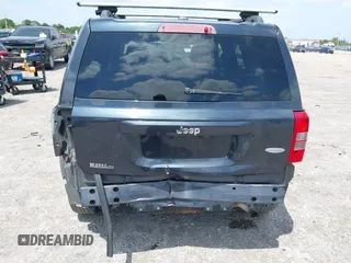 2014 Jeep Patriot Latitude with VIN 1C4NJPFA4ED604145, listed as a IAAI auction lot 42091619 with 81,119 mi miles and . Bid and sale history available at carsss.com. Image 6.