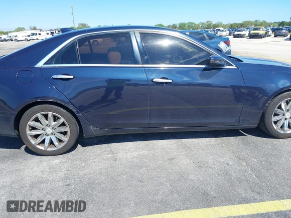 2016 Cadillac CTS RWD with VIN 1G6AP5SX8G0119984, listed as a IAAI auction lot 41679567 with 98,592 mi miles and . Bid and sale history available at DreamBid. Image 6.