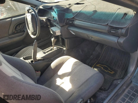 1994 Chevrolet Camaro z VIN 2G1FP22S1R2218727, wystawiony jako Copart lot #80922944 z przebiegiem 181 616 mil mil oraz Szkoda całkowita • Salvage title. Historia ofert i sprzedaży dostępna na DreamBid. Obrazek 8.