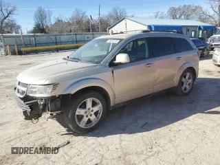 2010 Dodge Journey SXT with VIN 3D4PH5FV5AT169610, listed as a Copart auction lot 49323215 with 243,471 mi miles and Salvage Title. Bid and sale history available at carsss.com. Image 1.
