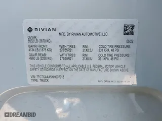 2022 Rivian R1T Adventure Package with VIN 7FCTGAAA5NN007018, listed as a IAAI auction lot 42018939 with 41,991 mi miles. Bid and sale history available at carsss.com. Image 9.
