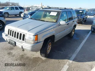 1997 Jeep Grand Cherokee Limited with VIN 1J4GZ78Y8VC718435, listed as a IAAI auction lot 41405361 with 210,599 mi miles. Bid and sale history available at carsss.com. Image 2.