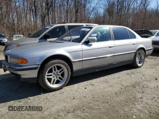 2000 BMW 7 Series 740iL with VIN WBAGH8341YDP12958, listed as a Copart auction lot 48118615 with 0 mi miles and Salvage Title. Bid and sale history available at carsss.com. Image 1.