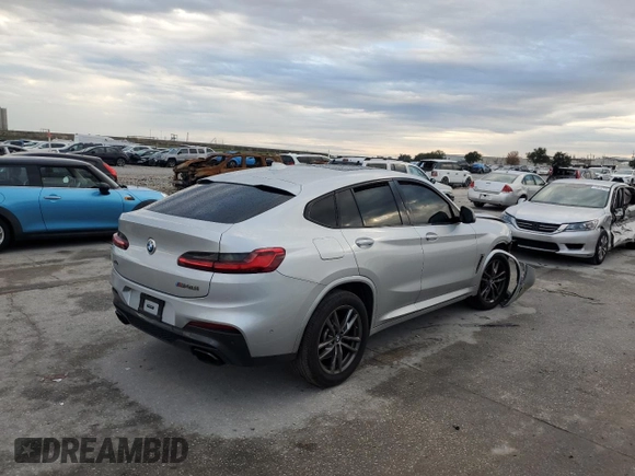 2021 BMW X4 M40i with VIN 5UX2V5C07M9G03839, listed as a Copart auction lot 79852123 with 0 mi miles. Bid and sale history available at carsss.com. Image 3.