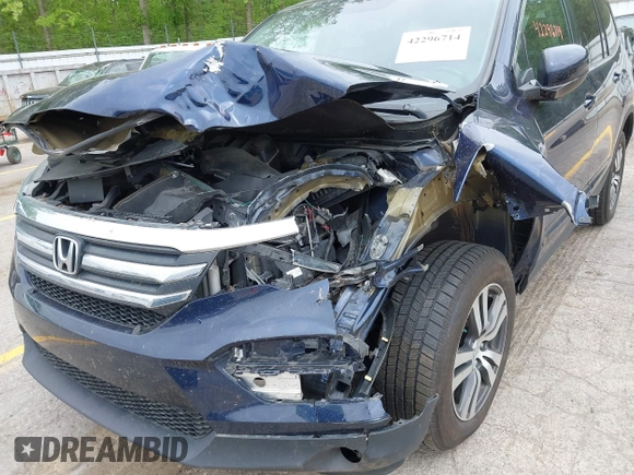2018 Honda Pilot EX-L with VIN 5FNYF6H57JB046433, listed as a IAAI auction lot 42296714 with Not provided miles and . Bid and sale history available at DreamBid. Image 6.