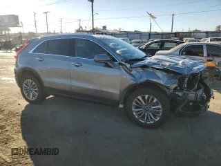 2024 Cadillac XT4 FWD Premium Luxury z VIN 1GYFZCR47RF126643, wystawiony jako Copart lot #50268745 z przebiegiem 24 583 mil mil oraz Czysty tytuł • Clean title. Historia ofert i sprzedaży dostępna na DreamBid. Obrazek 4.