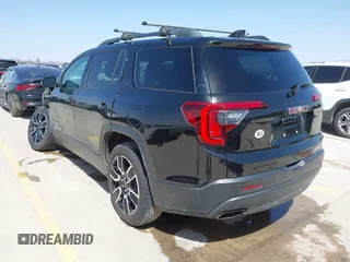 2021 GMC Acadia SLT with VIN 1GKKNMLS7MZ204928, listed as a IAAI auction lot 41719245 with 76,825 mi miles. Bid and sale history available at carsss.com. Image 3.