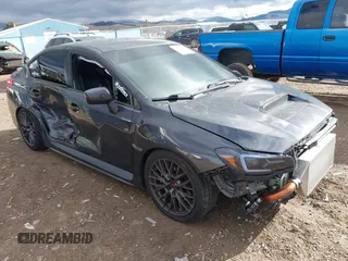 2015 Subaru WRX with VIN JF1VA1A65F9818409, listed as a IAAI auction lot 40895247 with 73,273 mi miles. Bid and sale history available at carsss.com. Image 1.