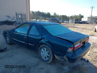 1995 Ford Thunderbird LX with VIN 1FALP62W3SH191775, listed as a IAAI auction lot 41250513 with 150,743 mi miles. Bid and sale history available at carsss.com. Image 3.