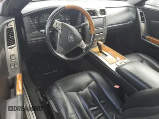 2004 Cadillac XLR z VIN 1G6YV34A945601007, wystawiony jako Copart lot #77077394 z przebiegiem Nie podano mil oraz Szkody całkowita. Historia ofert i sprzedaży dostępna na DreamBid. Obrazek 8.