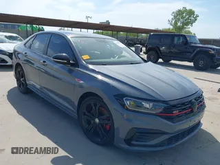 2020 Volkswagen Jetta GLI S z VIN 3VW6T7BU0LM047800, wystawiony jako IAAI lot #42263748 z przebiegiem 58 903 mil mil oraz . Historia ofert i sprzedaży dostępna na DreamBid. Obrazek 1.