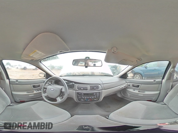 2007 Ford Taurus SE with VIN 1FAFP53U87A138588, listed as a Copart auction lot 56965245 with Not provided miles and Salvage title. Bid and sale history available at DreamBid. Image 14.