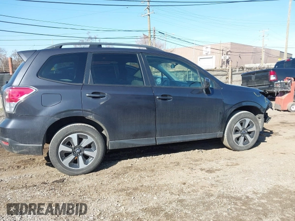 2018 Subaru Forester Premium with VIN JF2SJAEC9JH411903, listed as a IAAI auction lot 41844000 with 91,090 mi miles and . Bid and sale history available at DreamBid. Image 13.
