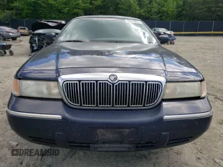1999 Mercury Grand Marquis LS с VIN 2MEFM75W2XX683074, выставлен на аукционе Copart как лот 55679225 с пробегом 198 956 миль миль и Списание • Salvage title. История ставок и продаж доступна на DreamBid. Изображение 5.