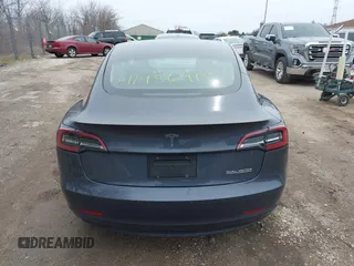 2023 Tesla Model 3 Performance with VIN 5YJ3E1EC9PF407365, listed as a IAAI auction lot 41956915 with 31,087 mi miles. Bid and sale history available at carsss.com. Image 16.