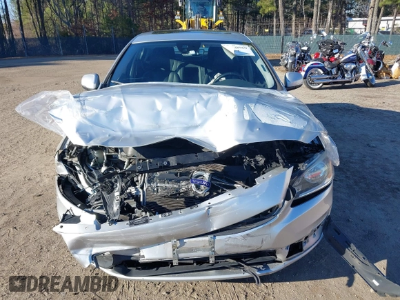 2016 Volvo S60 T5 Drive-E Premier z VIN YV126MFKXG1395519, wystawiony jako IAAI lot #41488969 z przebiegiem 109 130 mil mil oraz . Historia ofert i sprzedaży dostępna na DreamBid. Obrazek 11.